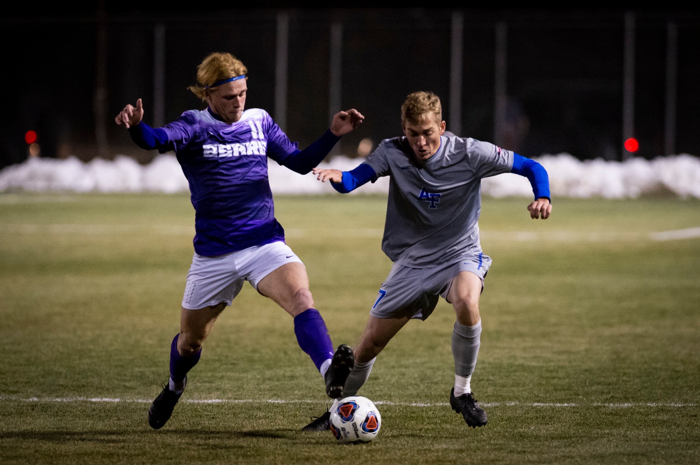 An Air Force and a Central Arkansas men's player contesting the ball